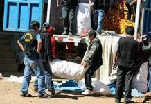 PUNO: LLEVABAN 7 PAQUETES DE DROGA OCULTOS EN CAJA DE MANDARINAS