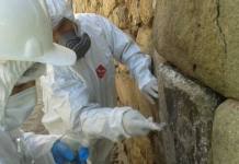 CUSCO: LIMPIAN MURO INCA AFECTADO POR QUEMA DE BASURA Y PIDEN CAPTURAR A LOS RESPONSABLES