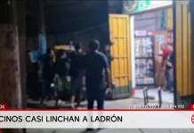 IQUITOS | VECINOS CAPTURAN Y GOLPEAN A SUJETO ARMADO EN FARMACIA.